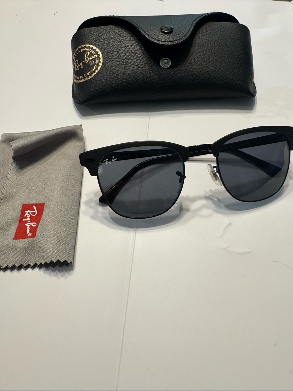 Ray-Ban Black Frame Sunglasses with Dark Gray Lenses